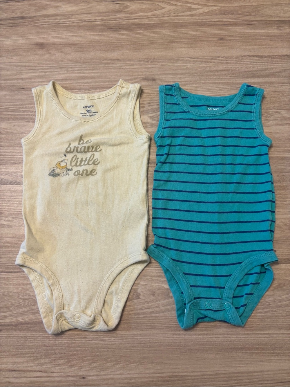 Carter’s sleeveless onesies 2-pack 9M